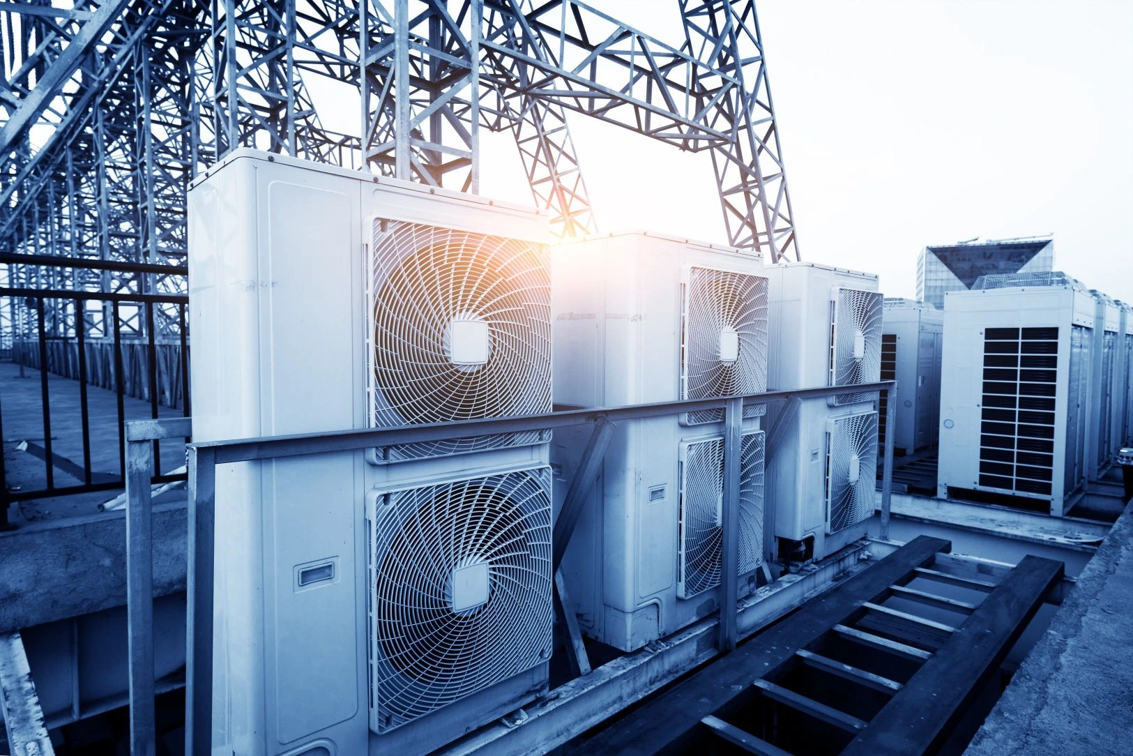 Outdoor air conditioning condenser units installed on a commercial rooftop